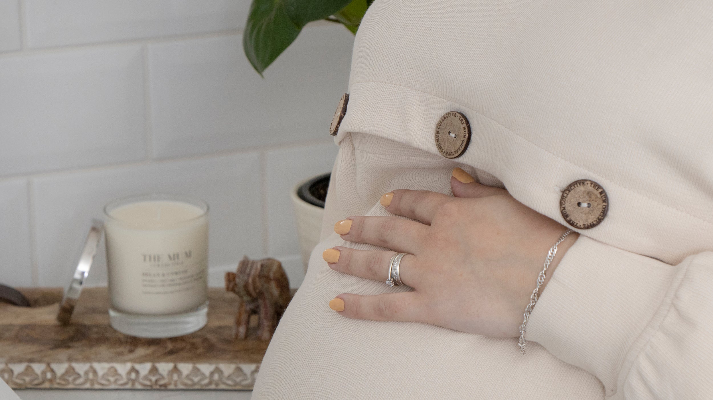 When should I start buying maternity clothes?